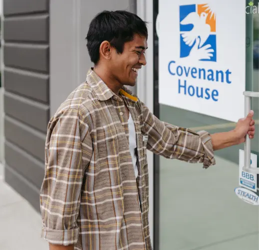 Man entering the Covenant House building.