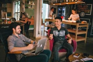 A Fractional CFO and a Small Business Owner Having Conversation Seating on Chair