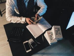 Accountant Counting Money for Small Business Cash Flow Management